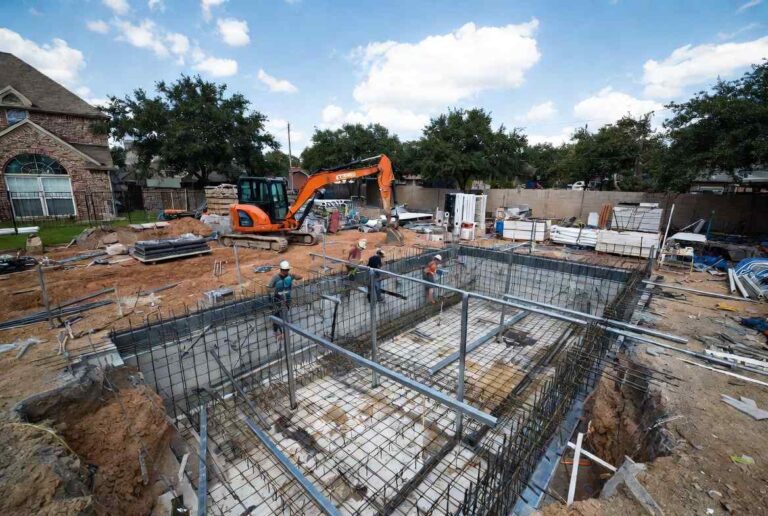 gunite pool vs fiberglass pool gunite vs fiberglass best pool type for Texas - pool during construction construction dust in pool new homes being built near pool protect pool from construction