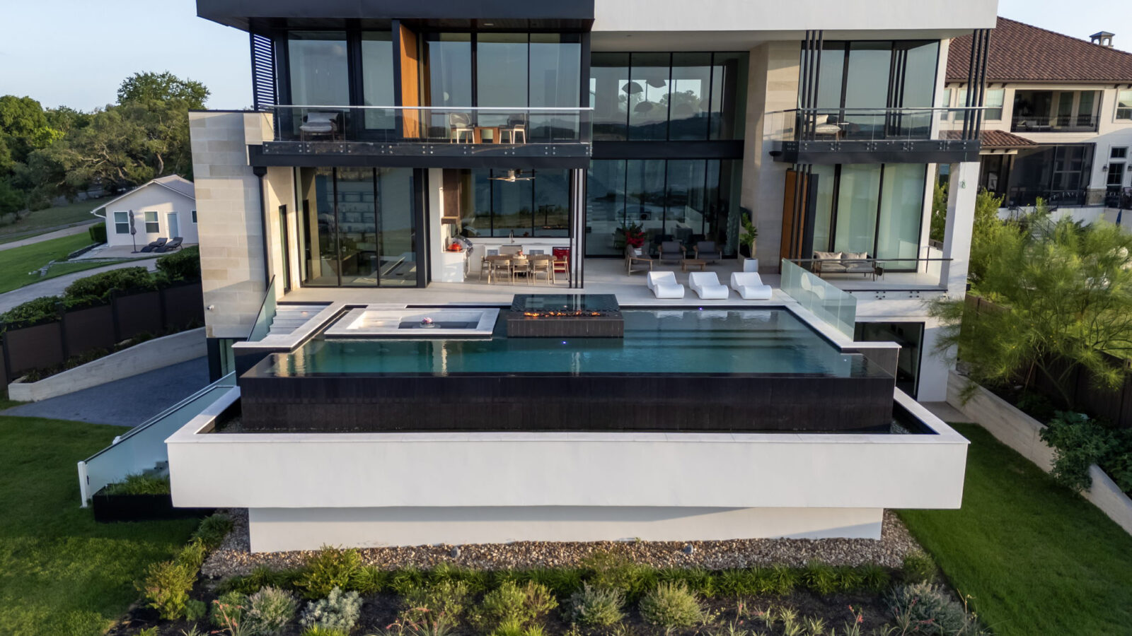 freeform vs geometric pool, pool shapes, pool shape ideas, best pool shape for backyard, pool design shapes - negative edge pool infinity pool maintenance, vanishing edge pool, negative edge pool, infinity edge pool DFW - pool resurfacing near me, pool renovation, pool restoration services