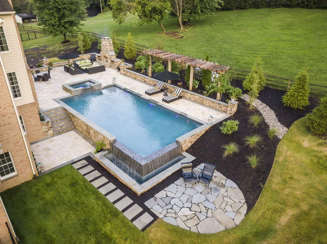 Pool Deck Material Ideas That Create a Beautiful Low Maintenance Texas Pool Area - downside of salt water pool, saltwater pool problems, saltwater pool maintenance cost, saltwater vs chlorine corrosion - solar powered pool skimmer, solar pool skimmer, floating pool skimmer, robotic pool skimmer