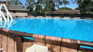 infinity pool maintenance vanishing edge pool negative edge pool infinity edge pool DFW - chlorine to salt conversion convert to salt water pool salt water pool conversion how to convert pool to salt water - pool closing vs winterizing Texas, winterize pool Texas, do you need to winterize a pool in Texas