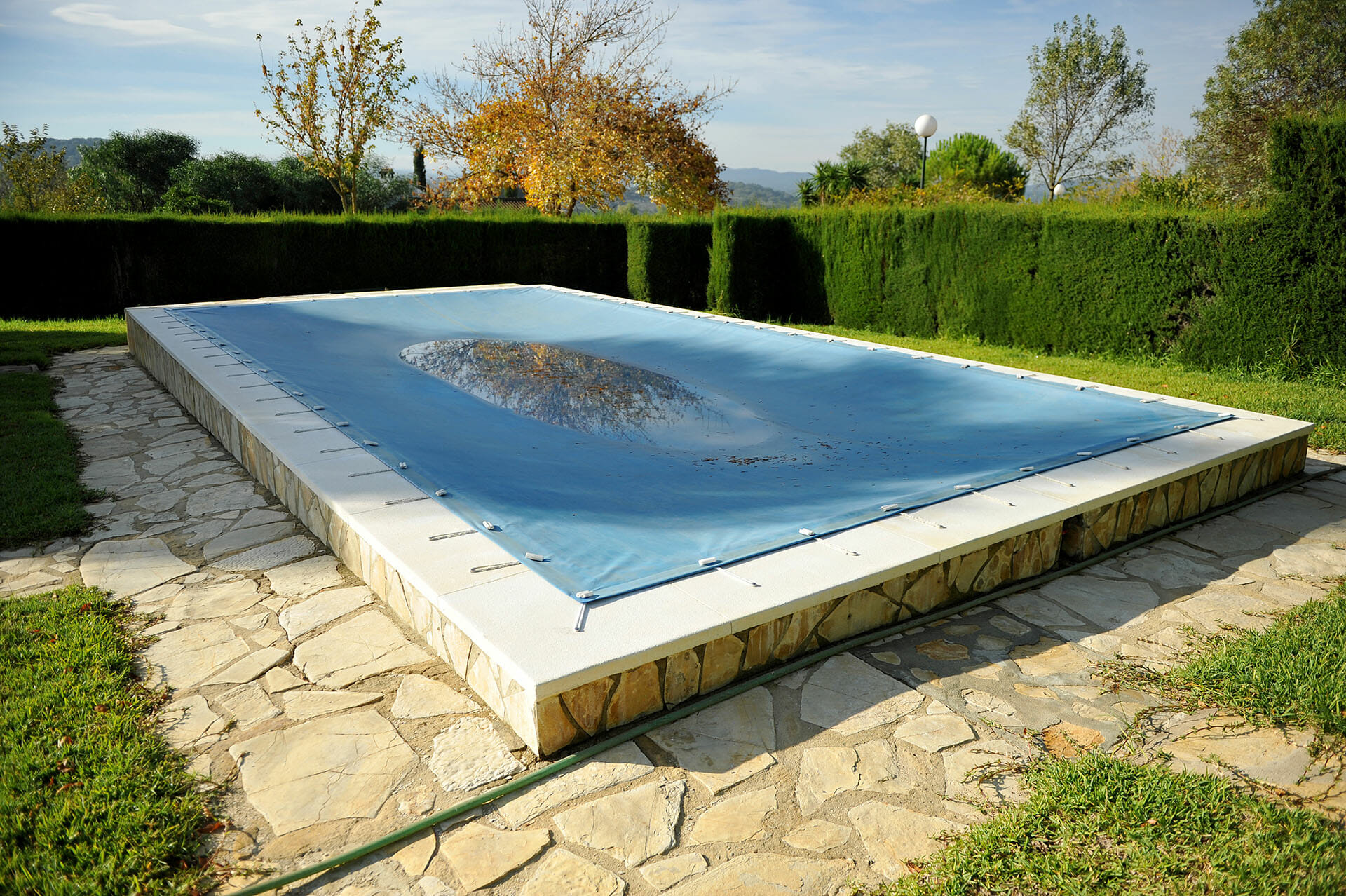 automatic pool cover track cleaning, automatic pool cover track maintenance, pool cover track debris, automatic cover stuck, pool cover maintenance