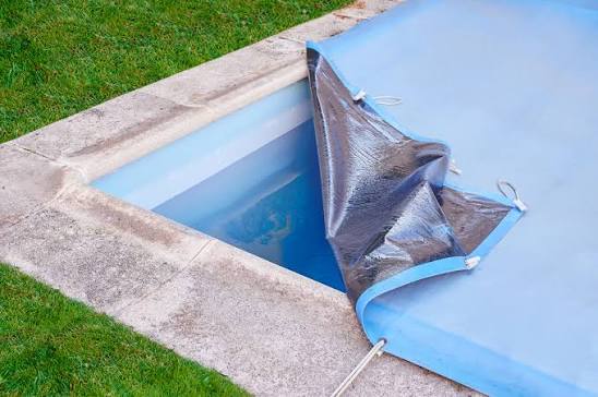 torn pool cover repair, pool cover tear, ripped pool cover, pool cover patch, pool cover replacement