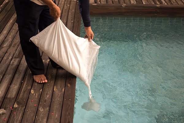 mustard algae, pool pollen vs algae, pollen in pool, yellow algae in pool,pool dust on floor