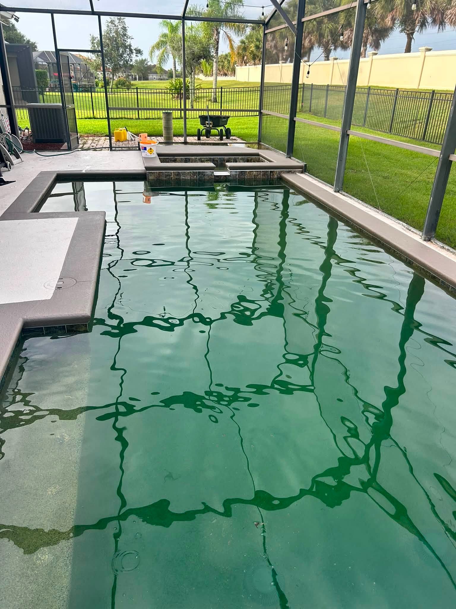 green pool after rain, pool turned green after rain, green pool water, rainwater pool algae, pool shock after rain